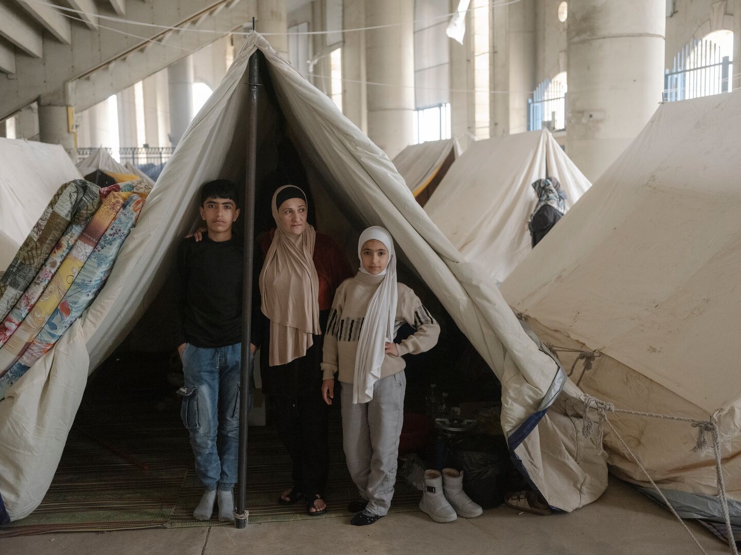 Lebanon_Family displaced from southern Beirut is now sheltering in a tent inside a stadium.