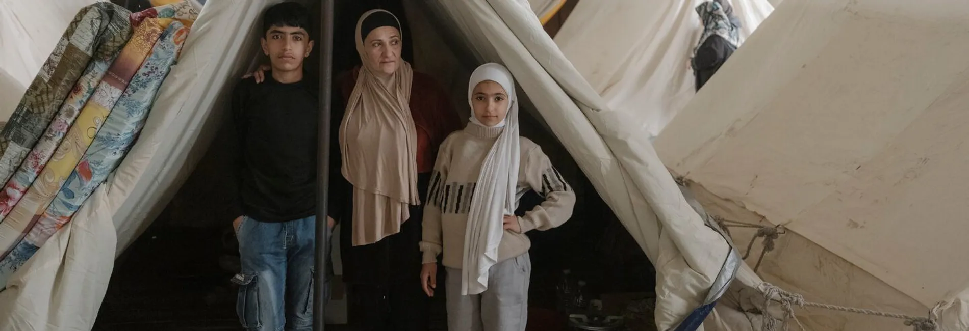 Lebanon_Family displaced from southern Beirut is now sheltering in a tent inside a stadium.